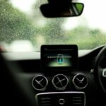 turned-on GPS monitor on vehicle dashboard