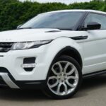 White Land Rover Range Rover Suv on Road