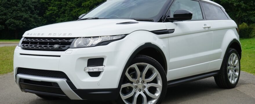 White Land Rover Range Rover Suv on Road